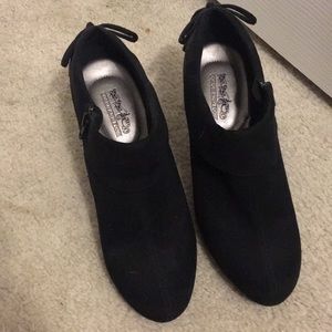 Black coach and four heels